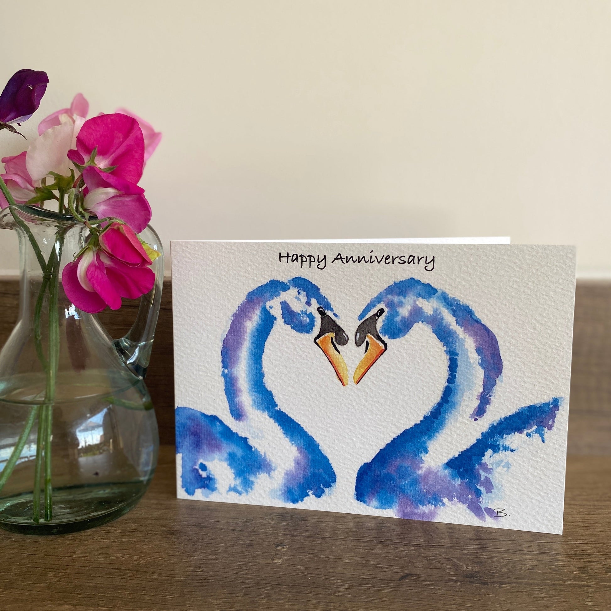 Happy anniversary blue swans greeting card
